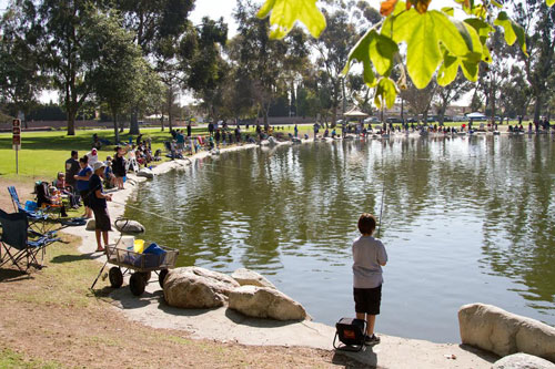 Snapshots: Kids tackle Fishing Derby at Mile Square Park – Orange County  Register