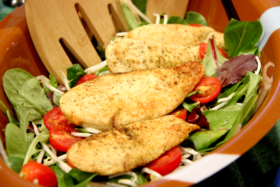 Salad topped with Foster Farms Grilled Chicken Salad